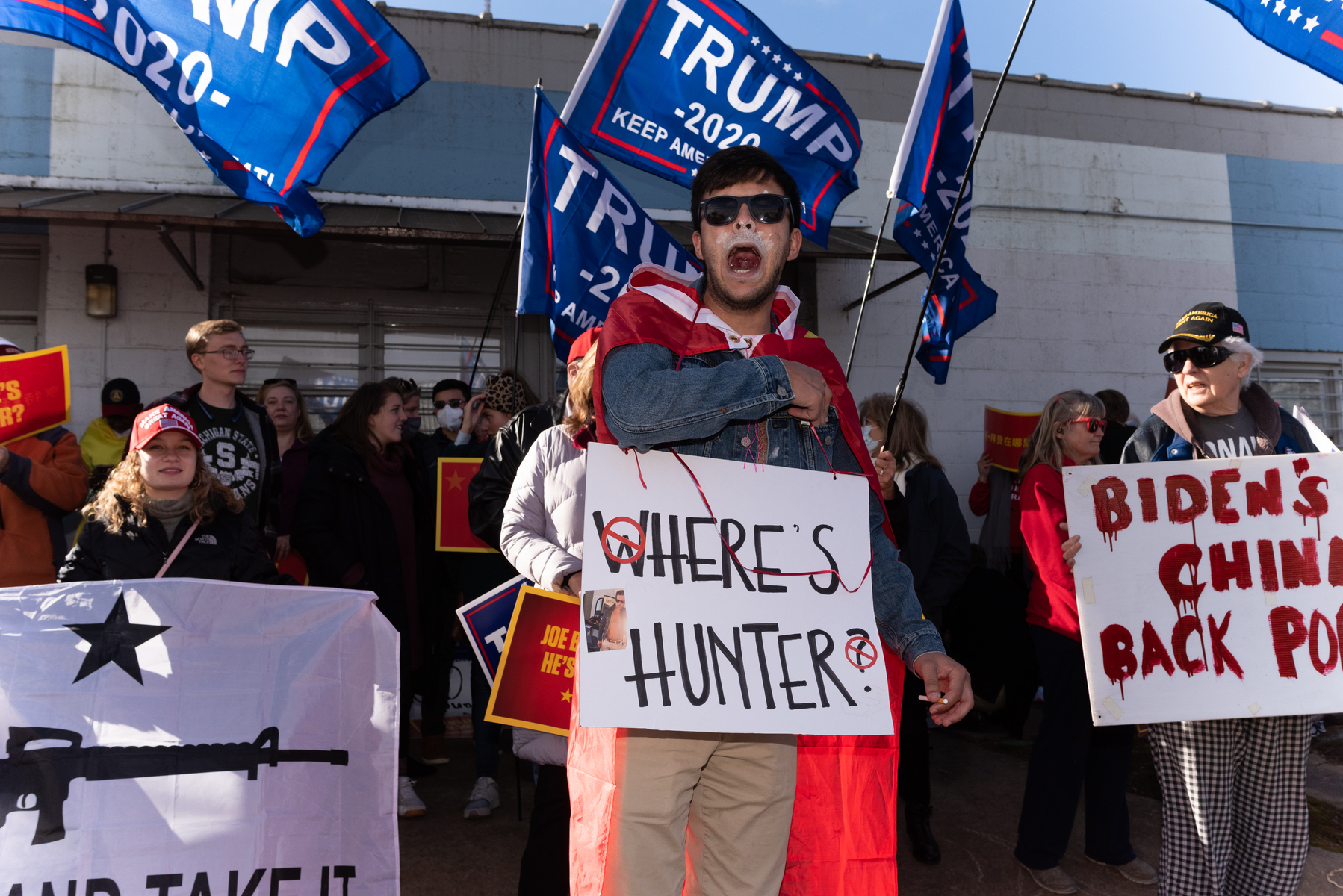 December 15, 2020 - Atlanta, GA. Pro-Trump demonstrators outside a drive-in rally for Georgia Democratic U.S. Senate candidates Jon Ossoff and Raphael Warnock.