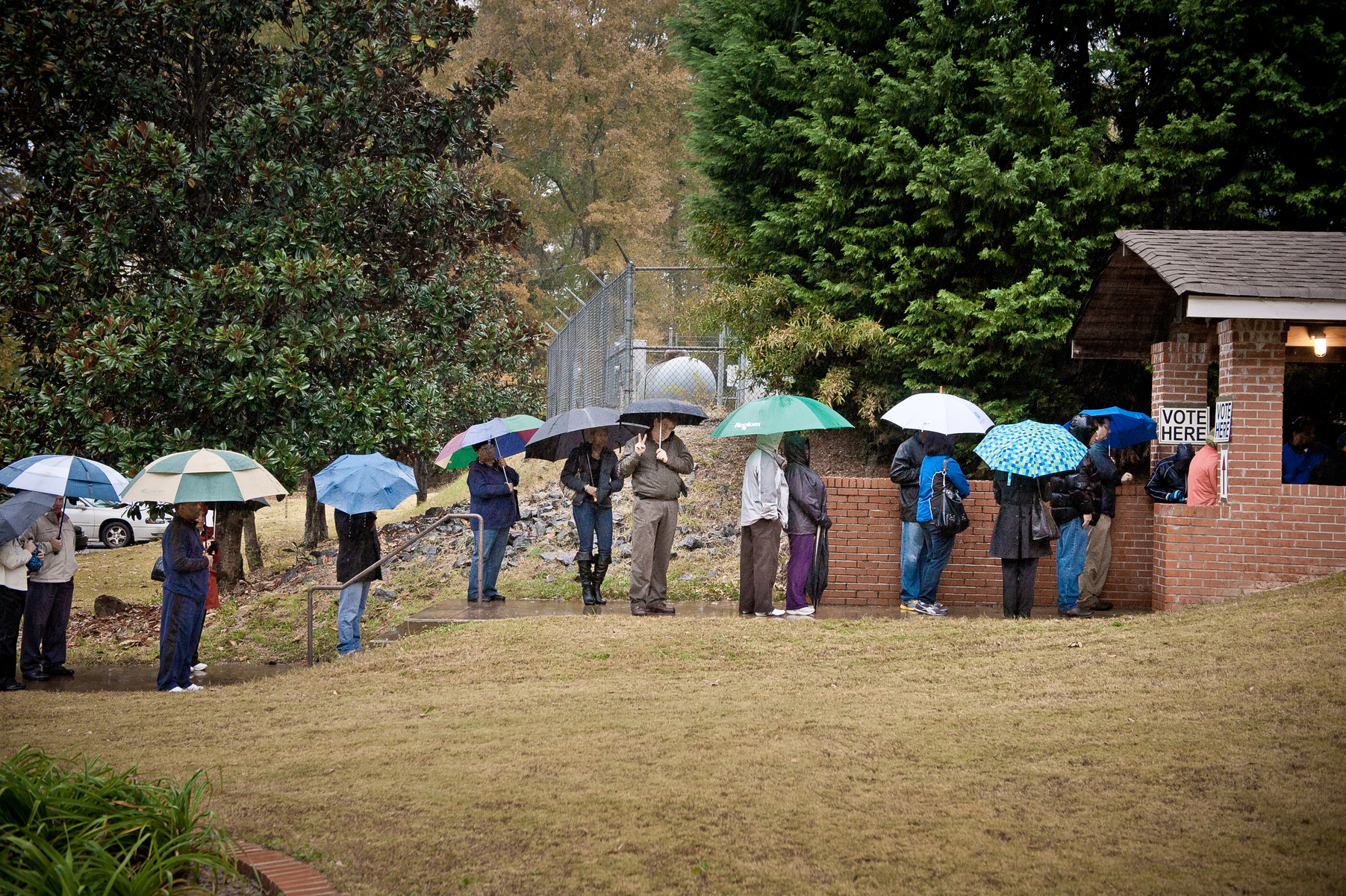 November 6, 2012.   Cobb County, GA. Voters wait in the rain lto cast their ballot in the 2012 Presidential election.  The swing state of Georiga is a hotly-contested  that offers 16 electoral votes.