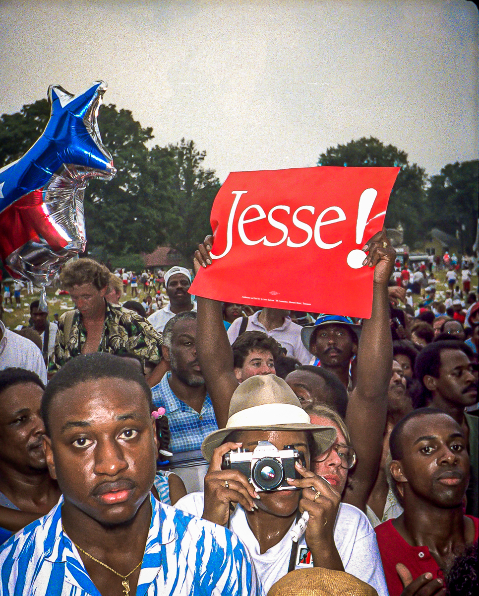 July 18, 1988 – Atlanta, GA. Supporters at an rally for Presidential hopeful Jesse Jackson speaks to supporters at a rally Saturday in Piedmont Park.  The Democratic National Convention is being held in Atlanta 7-16 thru 7-23.