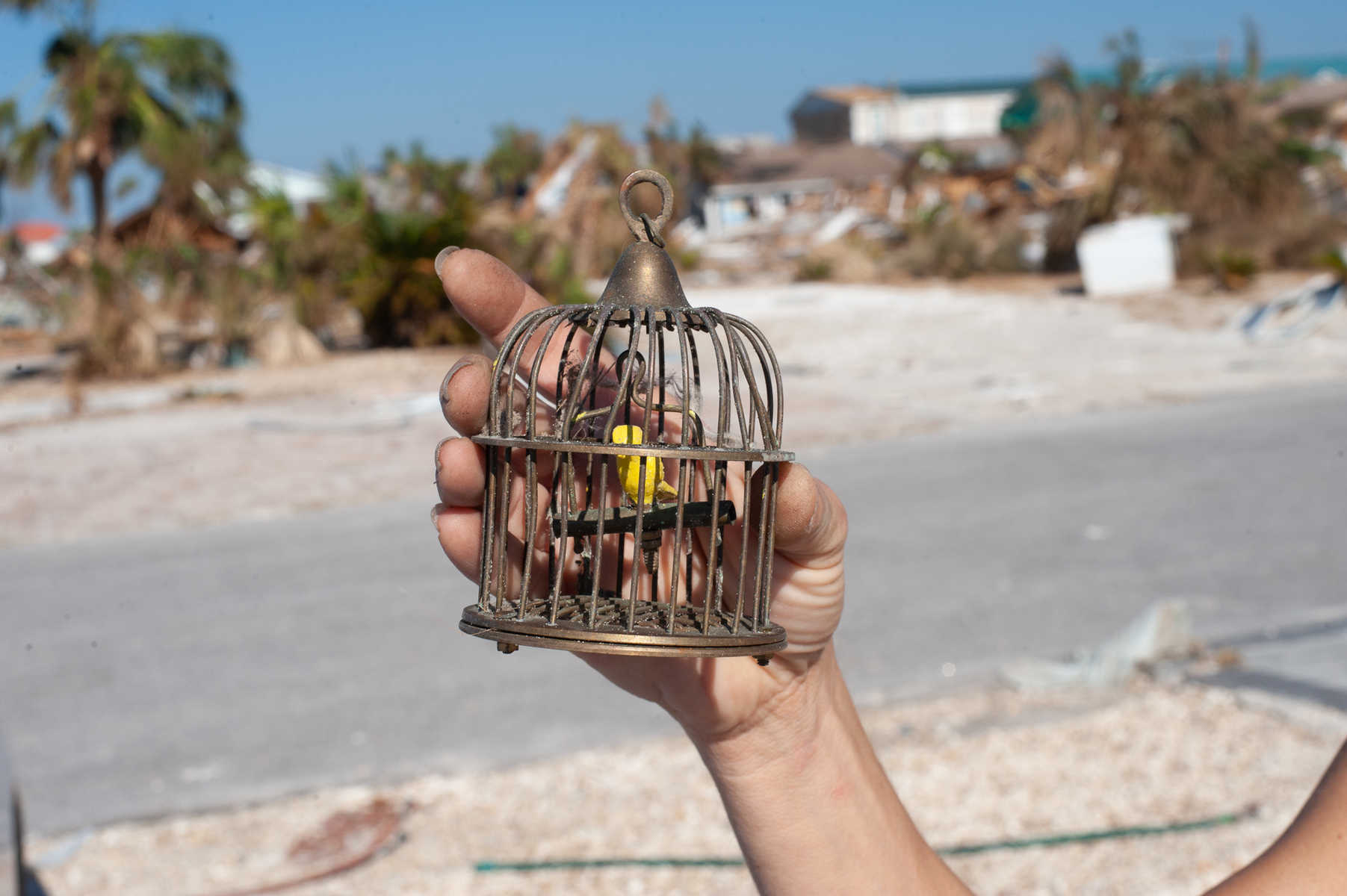 October 18, 2018 - Mexico Beach, FL - Adelete Mamary of Atlanta holds what is left of her vacation home in Mexico Beach, Florida after Hurricane Michael as passed through the area on October 10, 2018. Florida.  The hurricane hit the Florida Panhandle as a category 5 storm causing massive damage and claimed the lives of more then a dozen people.